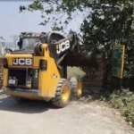 डीएम सविन बंसल के आदेश पर खुला रास्ता; सड़क कराई कब्जामुक्त